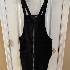 Forever 21 black jumper dress with front zipper. NWT. Non-smoking home.